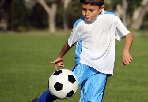 Kid Playing Soccer